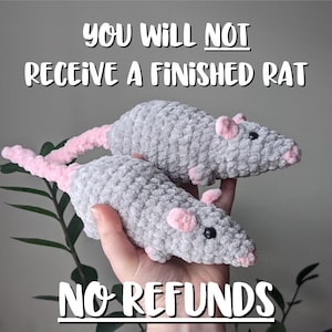Two gray crocheted rats with pink ears, noses, and tails. The text 'you will not receive a finished rat' is displayed above the rats, and "no refunds" is displayed below the rats.
