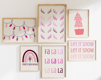 May include: A set of six pink and white Christmas-themed prints with various designs, including a rainbow with a Christmas tree, a Christmas tree, a string of lights, a reindeer antler pattern, and the text "Fa La La La La La" and "Let It Snow Let It Snow Let It Snow".