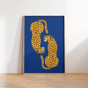 May include: Two stylized cheetahs facing each other on a blue background. The cheetahs are outlined in black and have a yellow and black spotted pattern.