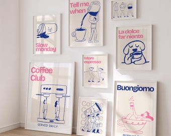 May include: A collection of framed art prints with coffee-themed illustrations and text. The prints feature blue and pink designs on a cream background, with phrases like "Coffee Club" and "Buongiorno". The art is displayed on a white wall.