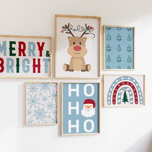 May include: A set of six framed prints with a Christmas theme. The prints feature a reindeer, a snowman, a Christmas tree, a snowflake pattern, and the words "Merry & Bright" and "Ho Ho Ho".