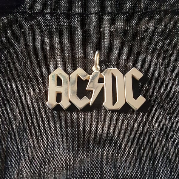 AC DC sterling silver pendant + giftbag and waxcord