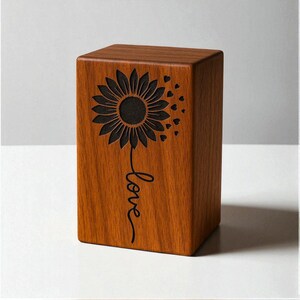 High-detail photo of engraved sunflower wooden urn