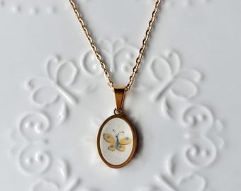Collana Heartland di Butterfly International / Porcellana rotta / Animali da fattoria