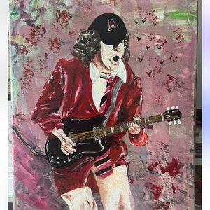 Angus young Ac/Dc guitarists