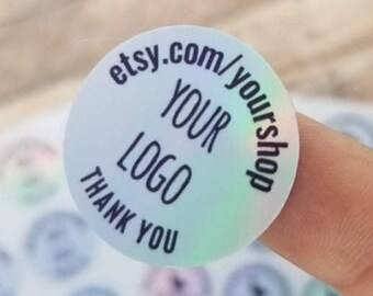 May include: Round iridescent holographic sticker with the text "etsy.com/yourshop" and "YOUR LOGO" in black text. The sticker also says "THANK YOU" in black text.