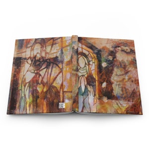 May include: Open journal with a colorful abstract design. The cover features a stained-glass style illustration with warm tones of brown, orange, and yellow. The design includes figures and architectural elements.