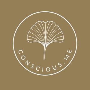 May include: A circular logo with a gold background features a white outline of a ginkgo leaf inside a white circle. The words "CONSCIOUS.ME" are written in white around the circle. The design is simple and elegant.