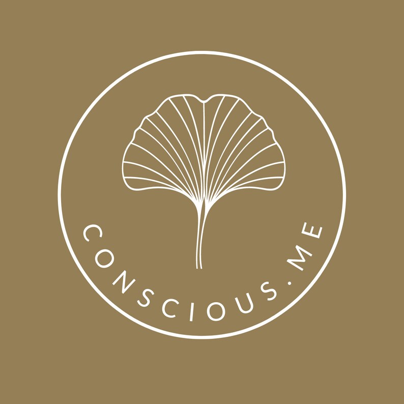 May include: A circular logo with a gold background features a white outline of a ginkgo leaf inside a white circle. The words "CONSCIOUS.ME" are written in white around the circle. The design is simple and elegant.