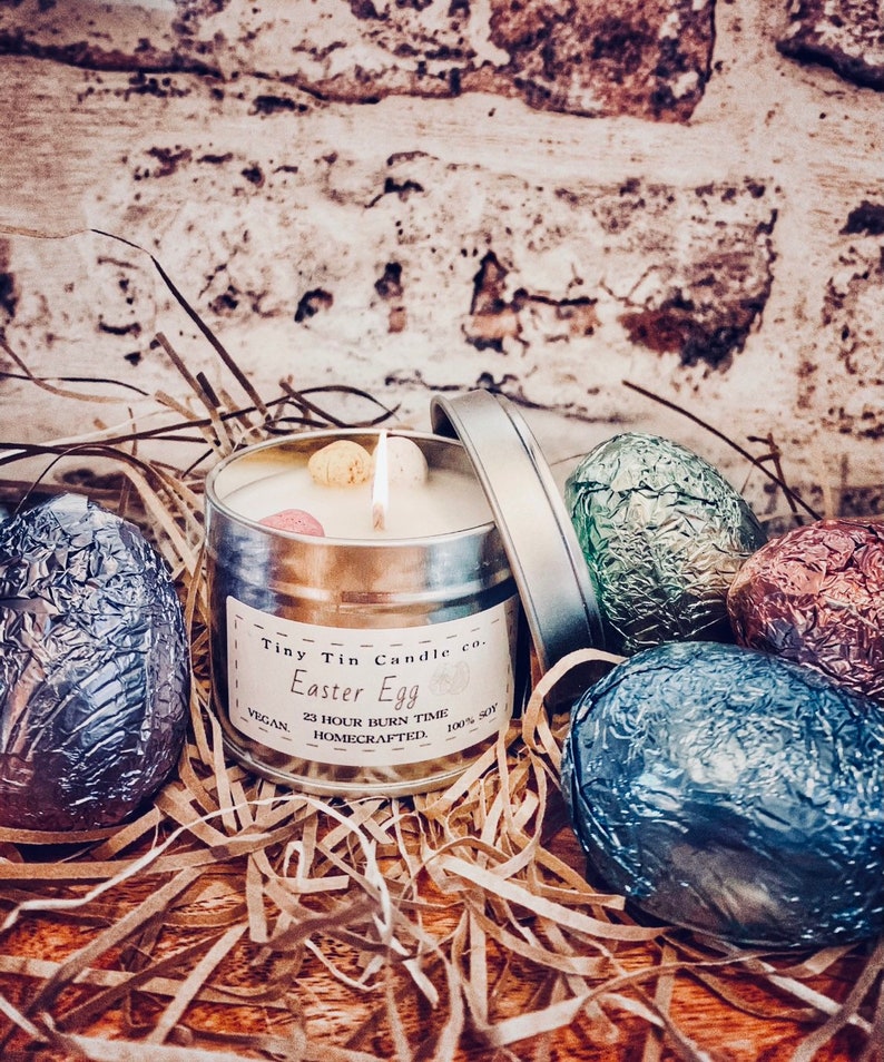 Homemade Candle Easter Egg Scented candle 100ml tin silver tin with easter egg label in black and white surrounded by easter eggs. The perfect easter gift