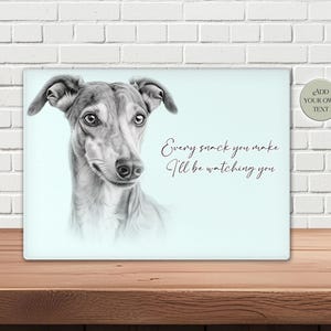 May include: A rectangular print featuring a detailed grayscale drawing of a greyhound dog's head and shoulders. The text "Every snack you make I'll be watching you" is written in cursive on the print.