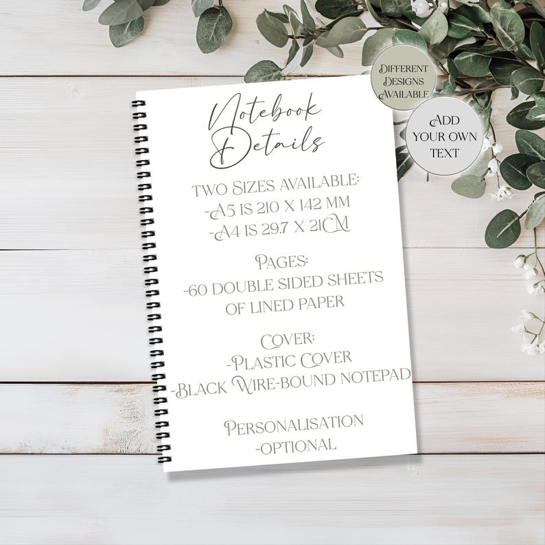 May include: A white notebook with black wire binding, displaying "Notebook Details." Available in A5 (210 x 142 mm) and A4 (29.7 x 21 cm) sizes. It contains 60 double-sided sheets of lined paper and a plastic cover. Personalisation is optional.