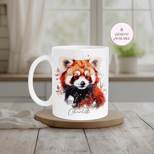 Custom red panda mug with a beautifully detailed watercolour red panda portrait and personalised name. A charming gift for nature lovers, zoo animal fans and anyone who adores red pandas. Ideal for birthdays, Mother's Day, Christmas or as a special personalised treat.