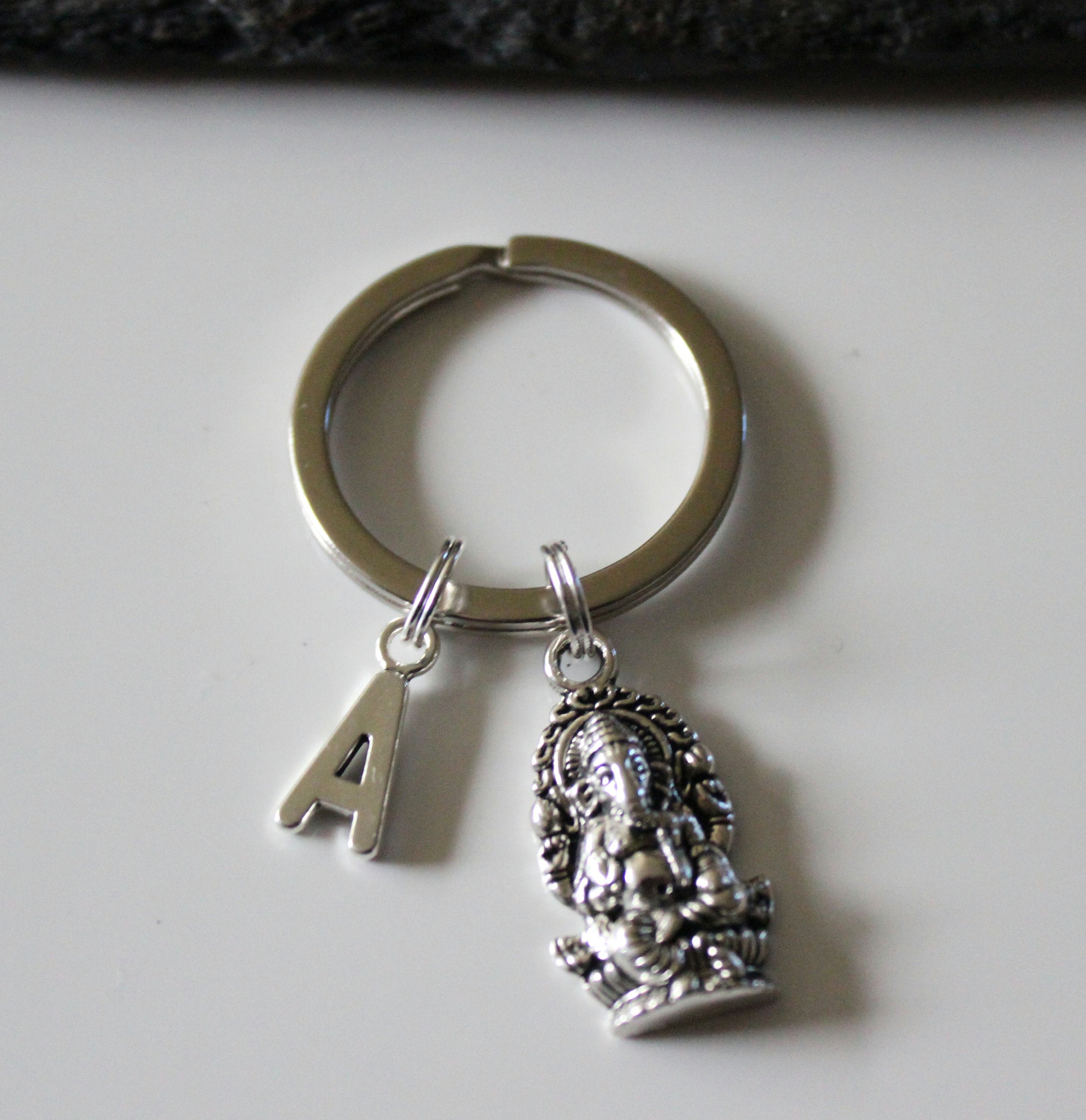 Silver ganesha keychain discount