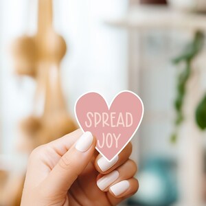 Répandez la joie dans un coeur autocollant affirmation positive 2 pouces