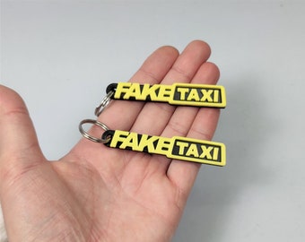 2x keychain logo FAKE TAXI gift idea fun plastic key ring