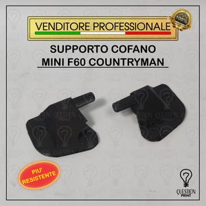 Può includere: Due supporti neri per cofano auto per Mini F60 Countryman. I supporti sono realizzati in un materiale resistente e sono progettati per adattarsi al veicolo. L'immagine include anche il testo "VENDITORE PROFESSIONALE" e "PIU' RESISTENTE".