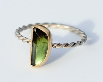 Silver ring with tourmaline in a gold setting