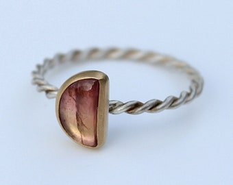 Silver ring with tourmaline in gold setting