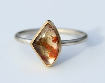 Silver ring with tourmaline in gold setting