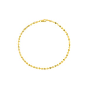 May include: A delicate gold bracelet with a repeating pattern of small, flat, oval-shaped links. The bracelet is a bright, shiny gold color and has a simple clasp closure. The jewelry is displayed against a white background.