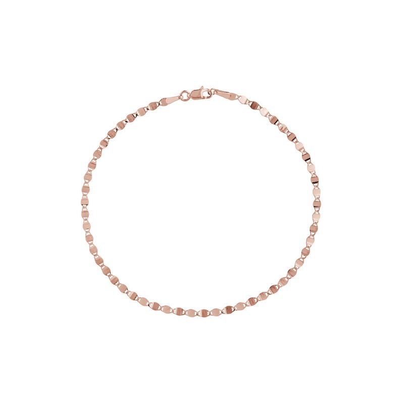 May include: A delicate rose gold bracelet with a repeating oval link design. The bracelet is closed with a small clasp. The jewelry is displayed on a white background.