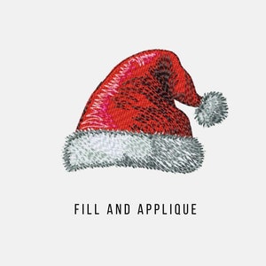 Peut inclure: Un bonnet de Père Noël rouge et blanc avec un pompon blanc. Le bonnet est un motif de broderie machine, rempli et appliqué.