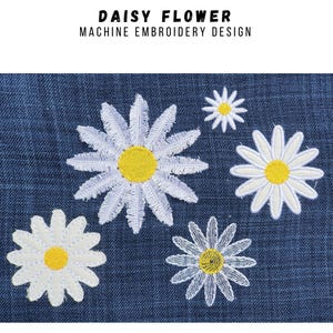 May include: Machine embroidery design featuring several white daisy flowers with yellow centers on a blue background. The text at the top reads "DAISY FLOWER MACHINE EMBROIDERY DESIGN". The text at the bottom reads "MULTIPLE SIZES IN DIFFERENT FORMATS".