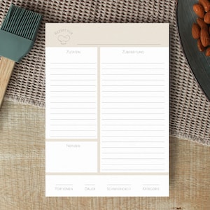 Könnte beinhalten: Eine druckbare Rezeptvorlage mit Abschnitten für Zutaten, Anweisungen, Notizen und Details wie Portionsgröße, Schwierigkeit und Kategorie.