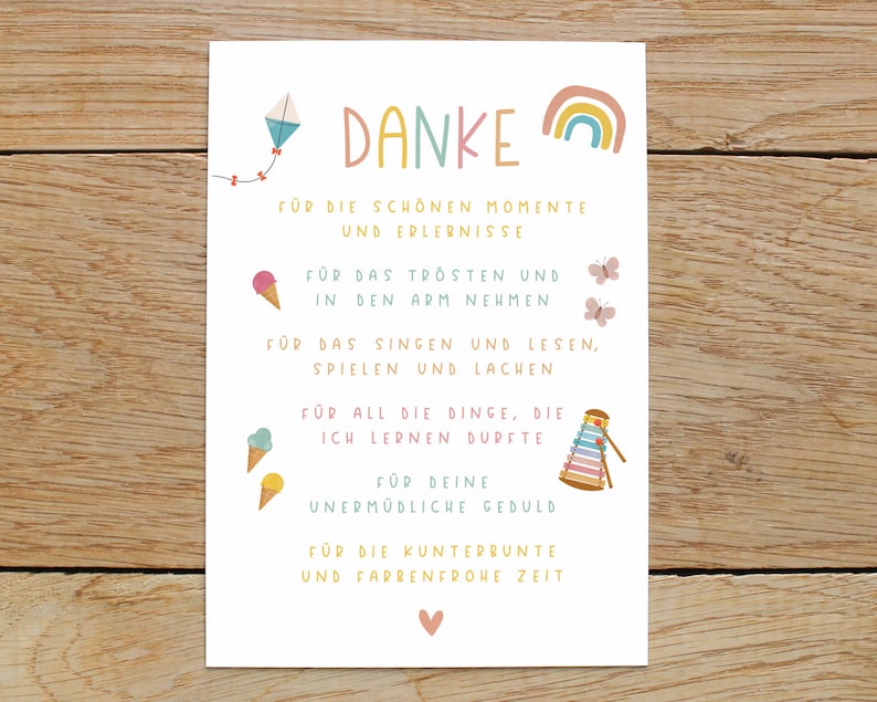 May include: A colorful thank you card with illustrations of a kite, ice cream cones, butterflies, a rainbow, and a xylophone. The card says "Danke" and includes the text "For the beautiful moments and experiences, for the comfort and holding in your arms, for the singing and reading, playing and laughing, for all the things I learned, for your tireless patience, for the colorful and joyful time."