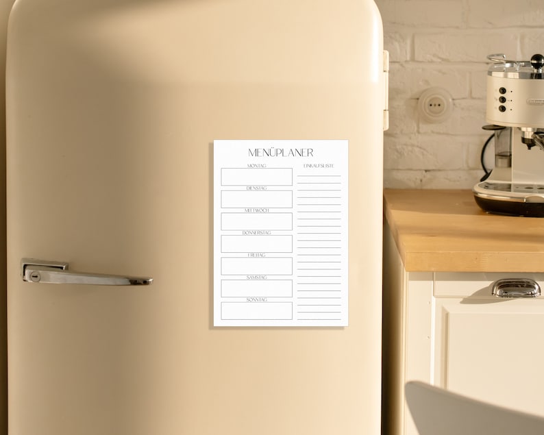 May include: A black and white printable menu planner with the text "MEN&Uuml;PLANER" at the top. The planner is divided into two columns, one for the days of the week and one for meal ideas.