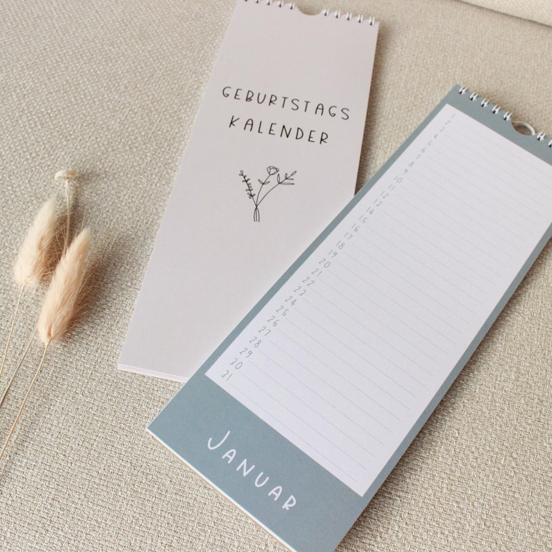 May include: A light blue and white calendar with the text "GEBURTSTAGS KALENDER" and a small flower illustration. The calendar is open to January and has numbered days from 19 to 31.