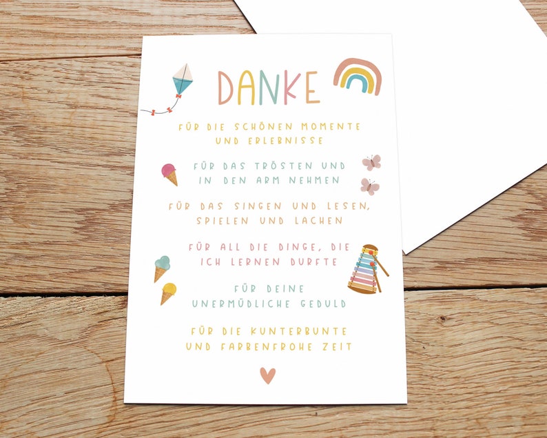 May include: A colorful thank you card with a rainbow, a kite, ice cream cones, a xylophone, and butterflies. The card says "Danke" and includes the text "For the beautiful moments and experiences, for the comfort and holding in your arms, for the singing and reading, playing and laughing, for all the things I was able to learn, for your tireless patience, for the colorful and joyful time."