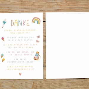 May include: A thank you card with a rainbow and a kite illustration. The card says "Danke" and lists reasons for gratitude, including "for the beautiful moments and experiences", "for comforting and holding", "for singing and reading", "for all the things I learned", "for your endless patience", and "for the colorful and joyful time".