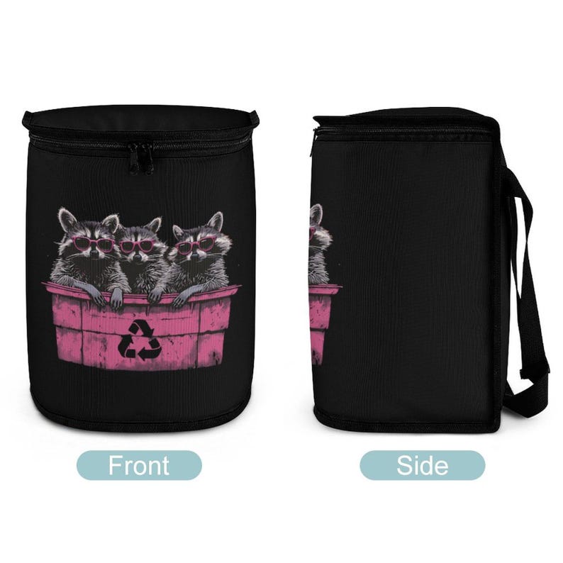 May include: A black car trash bag with a zipper closure and a shoulder strap. The front of the bag features a graphic of three raccoons wearing sunglasses in a pink trash can with a recycling symbol. The side of the bag is solid black.