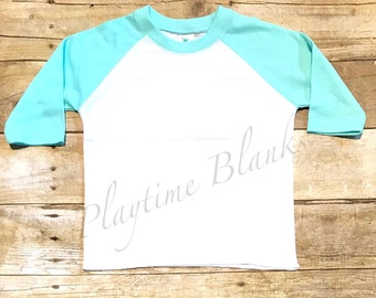 May include: A white long-sleeve baseball tee with turquoise blue sleeves. The tee has a crew neck and is made of a soft, comfortable fabric.