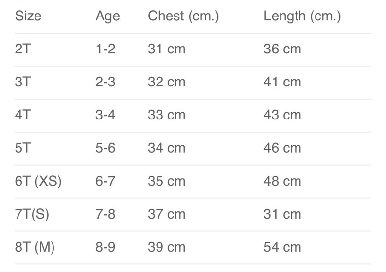 May include: A size chart for children's clothing, displaying measurements in centimeters. Sizes range from 2T to 8T, with corresponding age ranges, chest measurements (31-39 cm), and lengths (36-54 cm).