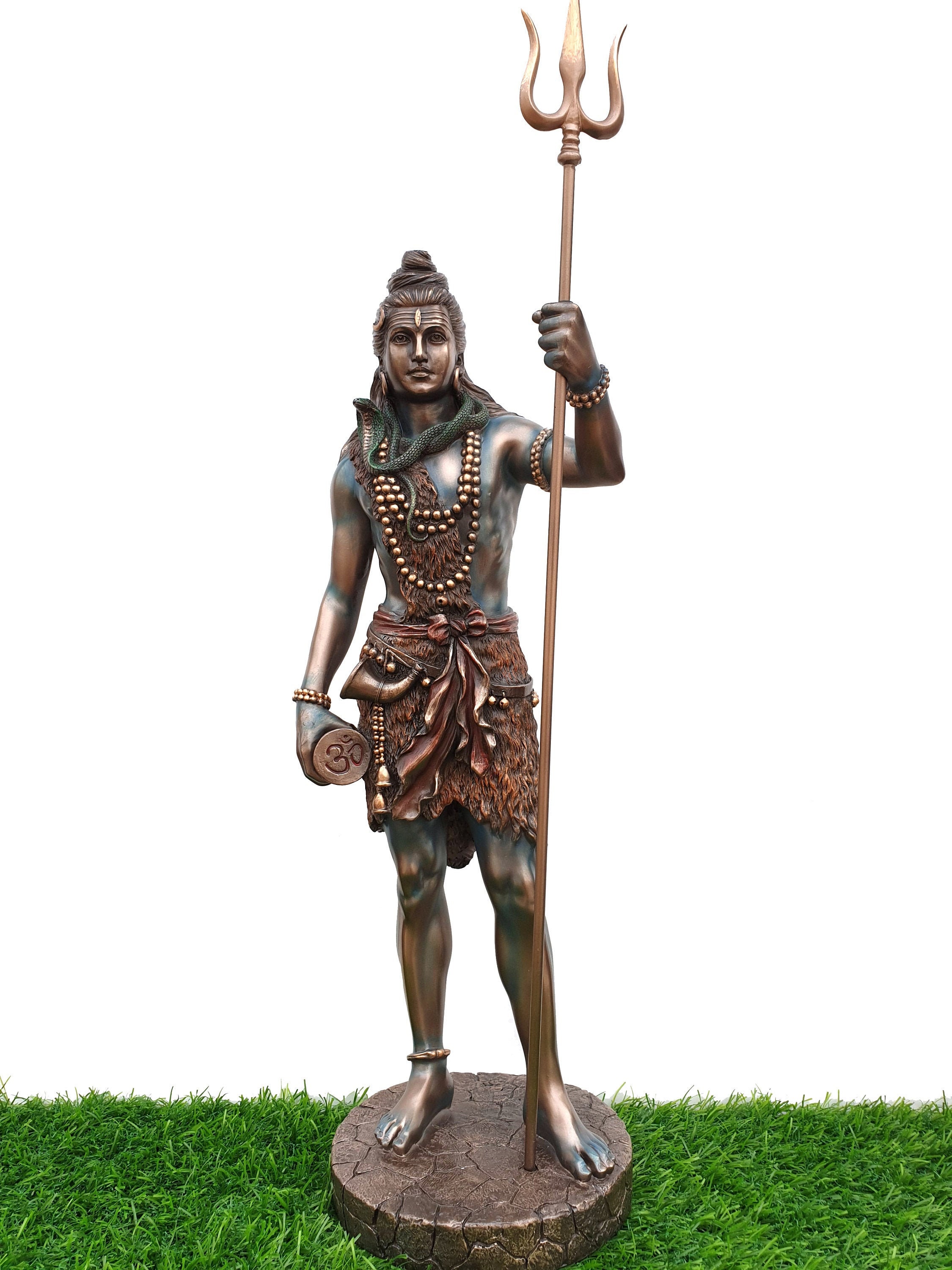 AI Art Generator: A majestic depiction of Lord Shiva, standing tall with  his trident in hand. He exudes power and tranquility, while the trident  symbolizes his divine authority. The scene is illuminated