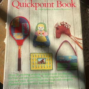 May include: The Quickpoint Book by Susan Iglehart & Barbara Schweizer. The book cover features needlepoint projects, including a tennis racket, doll, horse head, framed picture, and purse. The book promises over 40 exciting projects with full-size designs and step-by-step instructions.