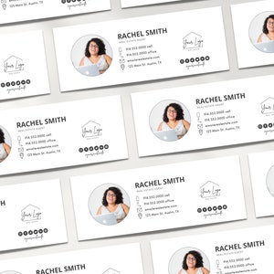 May include: A white business card with black text for a real estate agent named Rachel Smith. The card includes her phone number, email address, and website. A headshot of Rachel Smith is in the upper left corner of the card.
