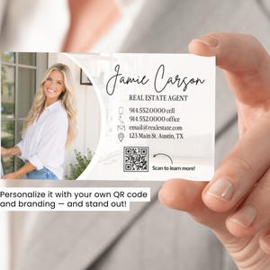 May include: A rectangular business card featuring a circular photo of a person, the name Jamie Carson, the title Real Estate Agent, contact details including phone numbers, email, address, and a QR code with the text Scan to learn more.