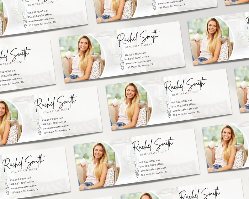 May include: A white business card with a gray background and a circle in the upper right corner. The circle contains a photo of a woman holding a cup. The text "Rachel Smith Real Estate Agent" is in black cursive font. The phone number, email address, and physical address are listed below the name.