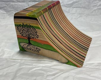 Quarter Pipe for fingerboards from used skateboards.