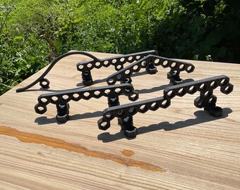 Rails for fingerboards made of iron nuts.