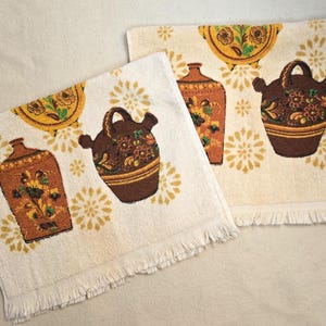 May include: A set of three ceramic nesting bowls in shades of blue, green, and white. The bowls feature a speckled glaze and a simple, modern design. The largest bowl measures approximately 6 inches in diameter.