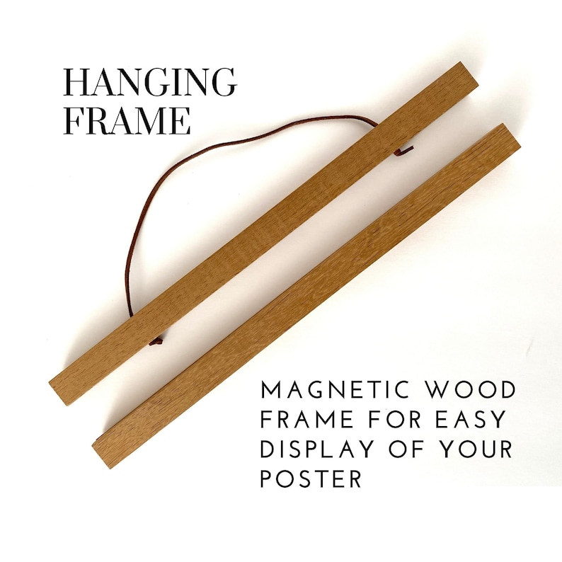 May include: Wooden hanging frame with a brown cord. The frame is made of two wooden strips with magnets for easy display of posters. The text "HANGING FRAME" and "MAGNETIC WOOD FRAME FOR EASY DISPLAY OF YOUR POSTER" are visible.