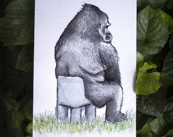 Gorilla sitting on a mini chair