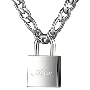 May include: Silver chain necklace with a padlock pendant engraved with the name "Alex".