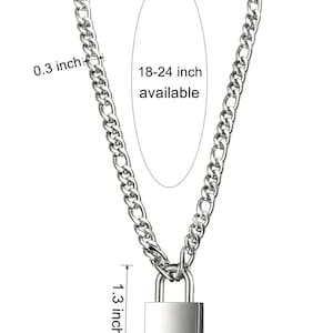 May include: Silver chain necklace with a padlock pendant. The chain is 0.3 inches wide and the pendant is 1.3 inches tall and 0.8 inches wide. The necklace is available in lengths from 18 to 24 inches.