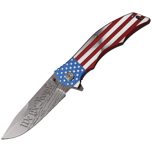 May include: A silver folding knife with a red, white, and blue American flag design on the handle. The blade is engraved with the text "We the People".